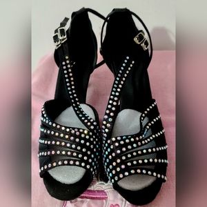 Beautiful black with rhinestones heels. Size 9 1/2